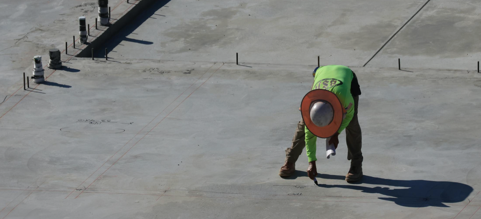 Concrete slab installation in Renton WA - contractor finishing garage floor slab