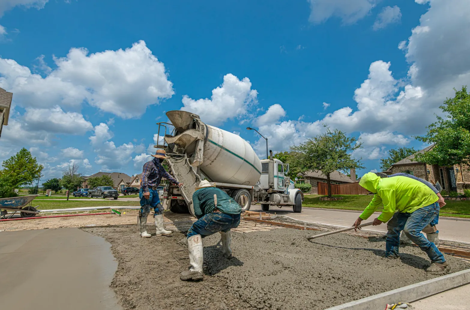 Concrete crew pouring a new residential driveway in Renton WA